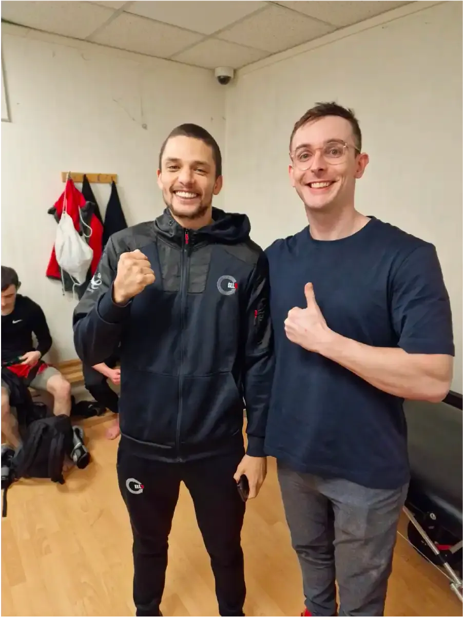 Satisfied patient showing thumbs up after physiotherapy treatment
