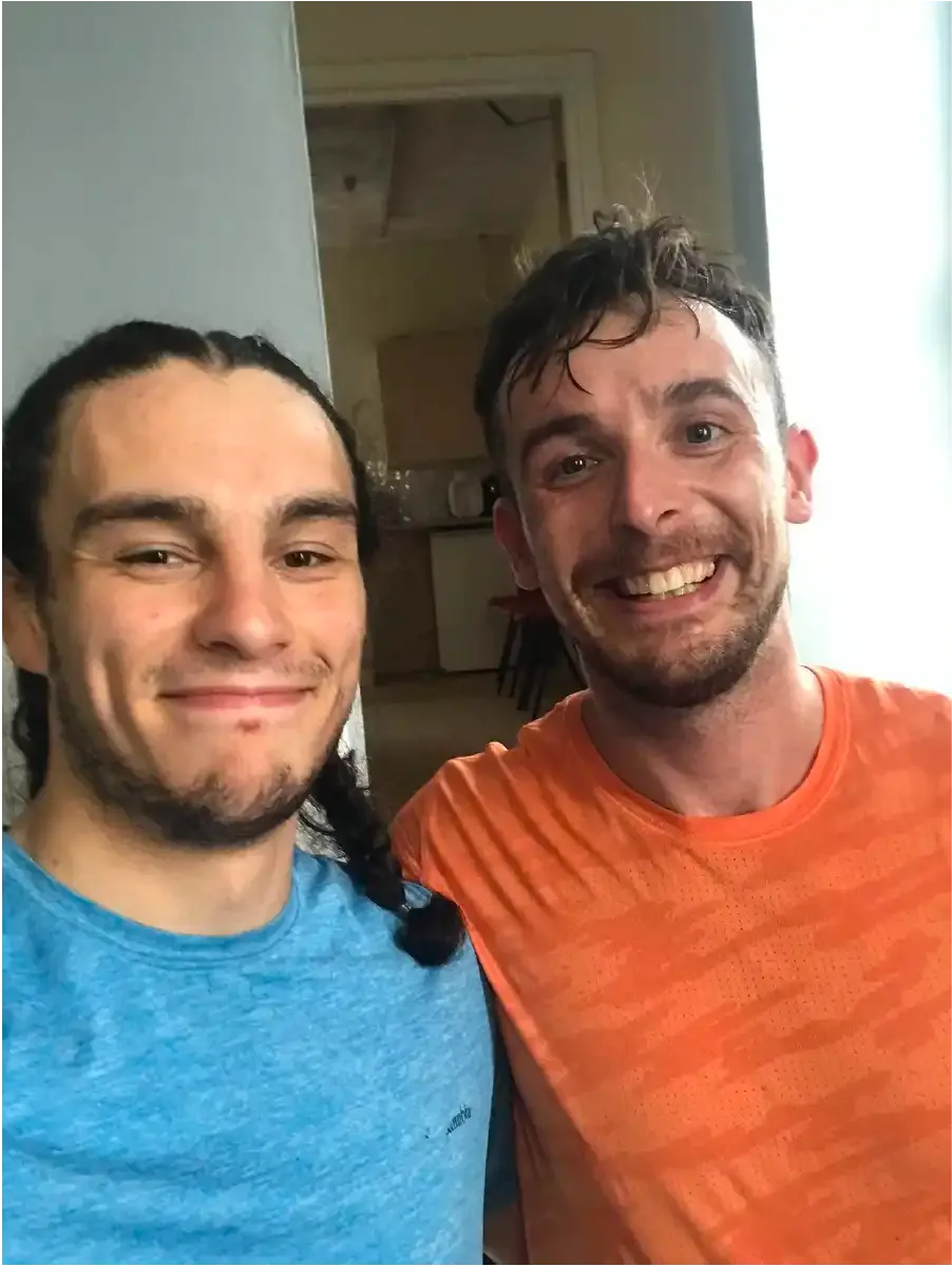 Client giving thumbs up after completing rehabilitation journey