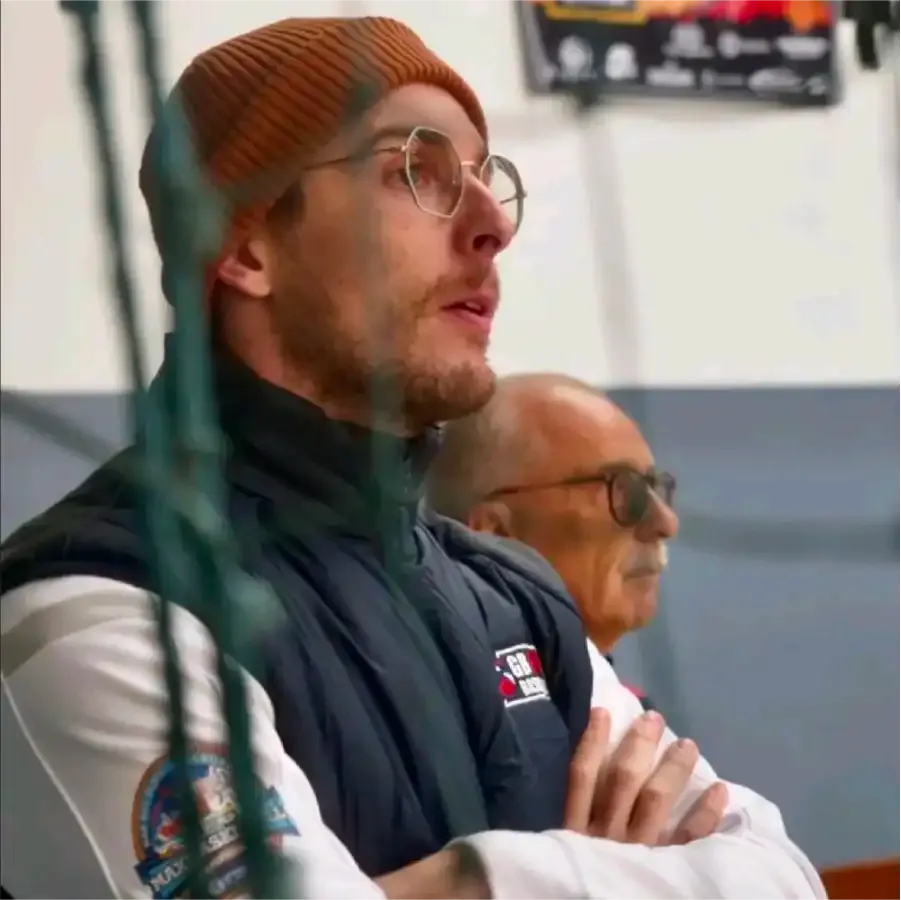 Connor Flynn providing courtside physiotherapy for GB MaxiBasketball