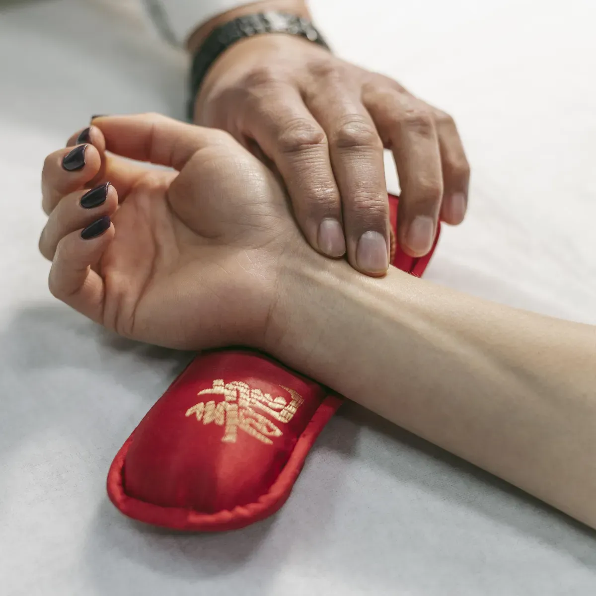 Ice pack and heat pad side by side representing treatment options